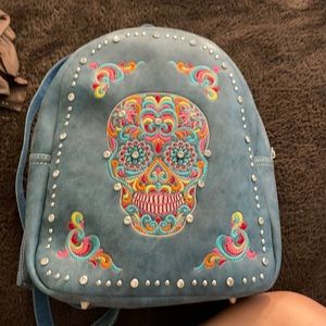 Skeleton face colorful mini blue backpack !